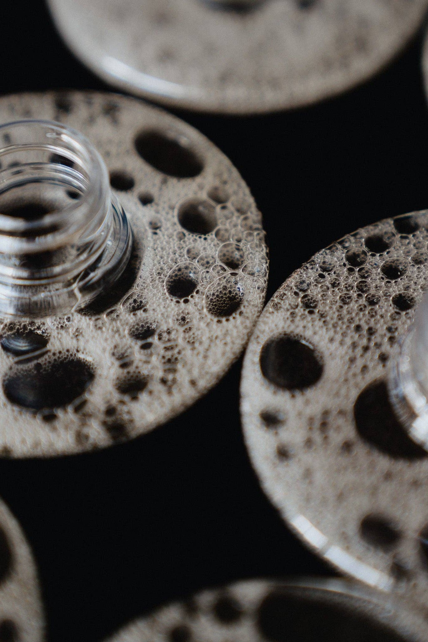 Close-up of open Picot body wash bottles
