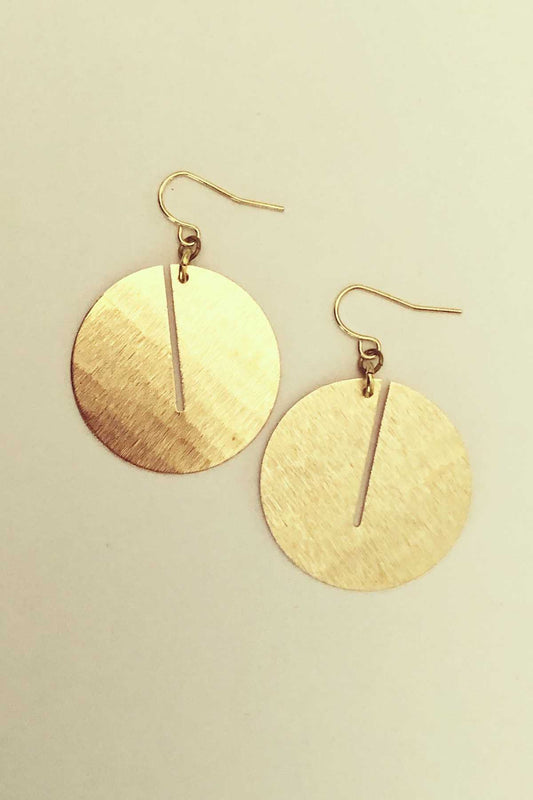 Eghah Earrings by Darlings of Denmark, brushed raw brass, circular dangle, circles with slits, made in Montreal