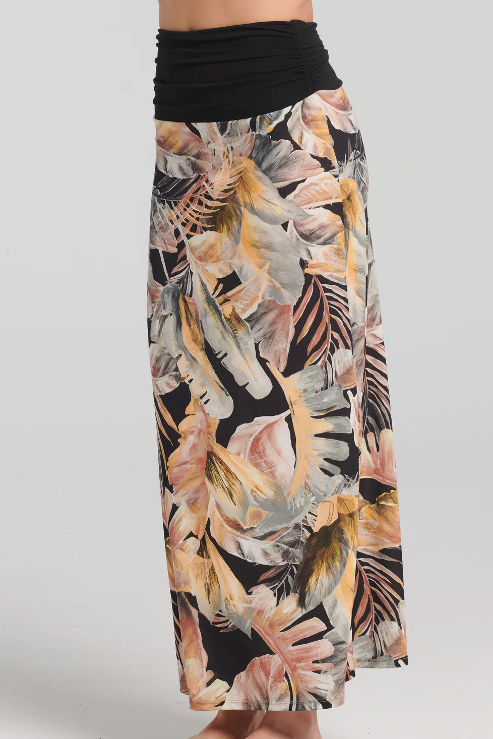 Divona Skirt by Kollontai, side view, wide black band at top, neutral toned tropical print below, wear as a strapless midi dress or a maxi skirt, sizes XS to XXL, made in Quebec