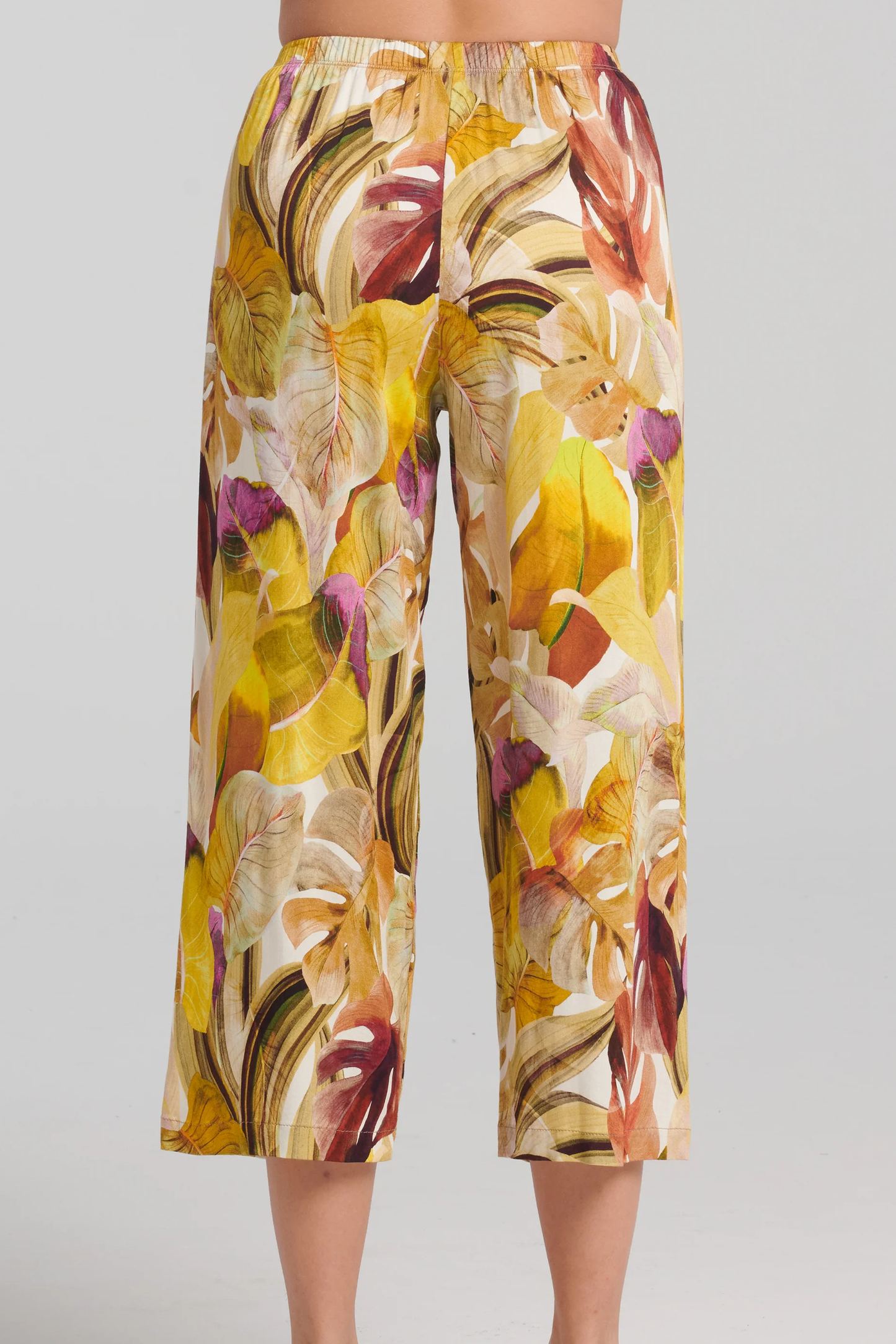 Anjea Pants by Kollontai, Yellow, back view, botanical print, elastic waist, cropped length, slightly wide legs, sizes XS to XXL, made in Montreal 
