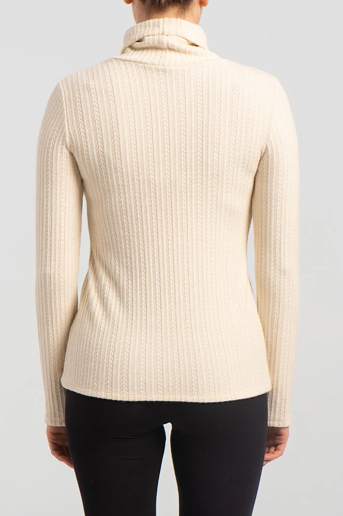 Back view close up of a woman wearing the Garfunkel Sweater by Kollontai in Cream with black pants, standing in front of a white background 