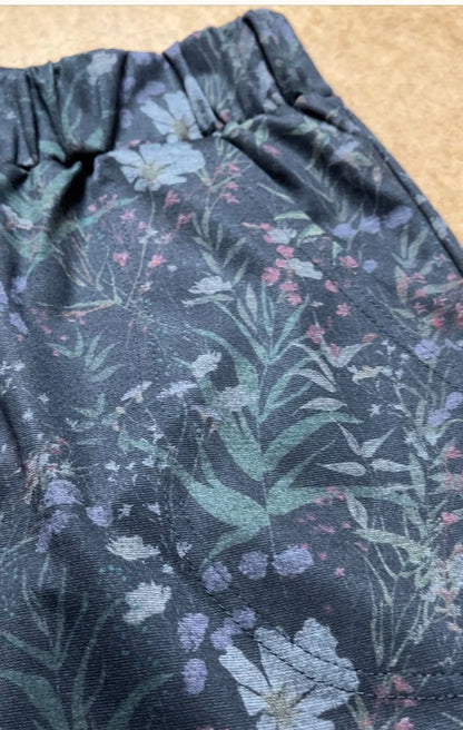 Detail of the Woodland print fabric of the Luisa Pants by Tangente 