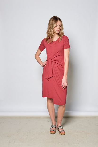 Rachelle Dress by Tangente, Lipstick, short sleeves, asymmetrical front hem, diagonal front seam, draping built-in ties, knee-length, anti-pill jersey, sizes XS to XXL, made in Ottawa