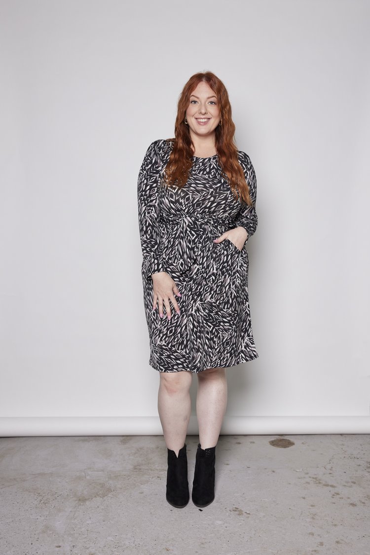 Gwen Dress by Tangente, Black, long sleeves, knee-length gathered skirt, attached ties at waist, in-seam pockets, sizes XS to XXL, made in Ottawa
