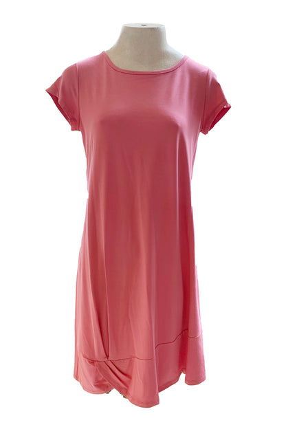 The Catreena Dress in Sorbet by Pure Essence is shown on a mannequin against a white background 