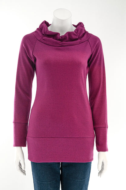 The Myrtille Sweater by Karkass in Purple, with a large pleated cowl neck, long sleeves, and wide band at the bottom is shown on a mannequin against a white background. 
