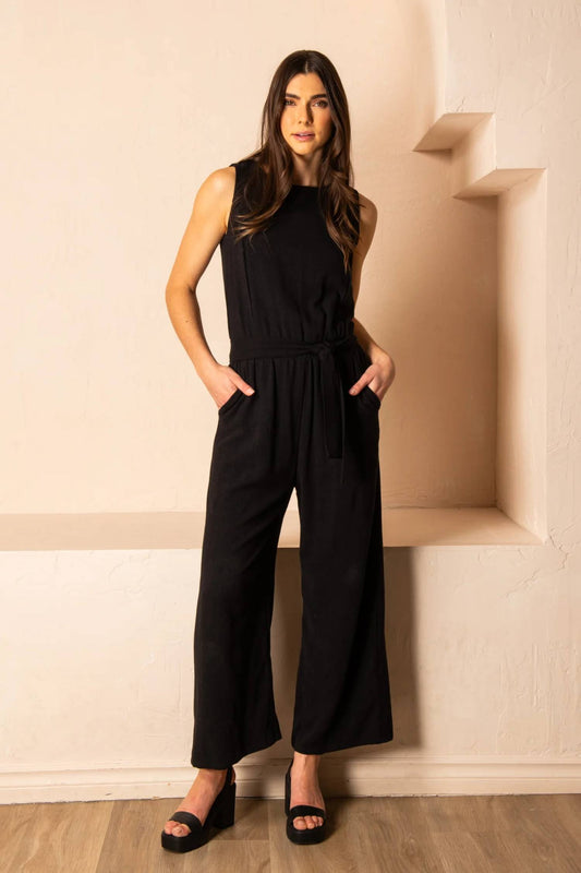 Brume Jumpsuit by Cherry Bobin, Black, sleeveless, high front neckline, cutout and tie detail at back neckline, elastic waist, tie belt, invisible back zipper, eco-fabric, rayon and linen, sizes XS to XL, made in Montreal 