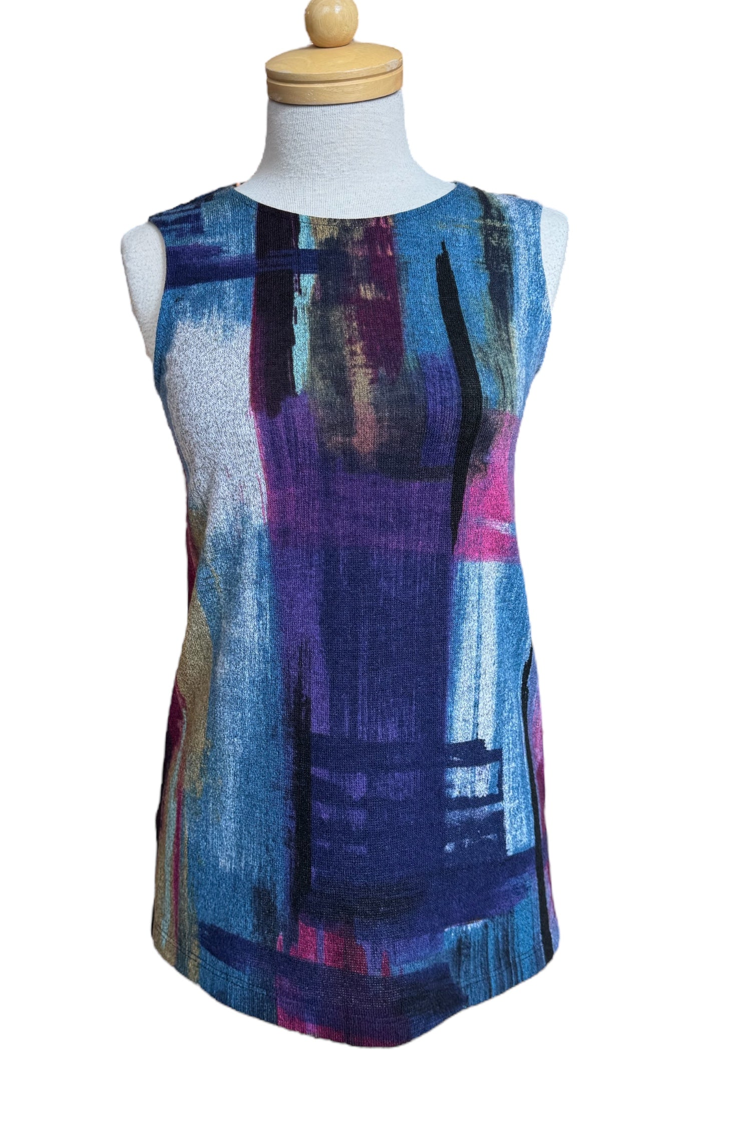 The Preston Top by Compli K in Blue and Berry Abstract print, a long sleeveless top with a round neck, is shown on a mannequin in front of a white background. 