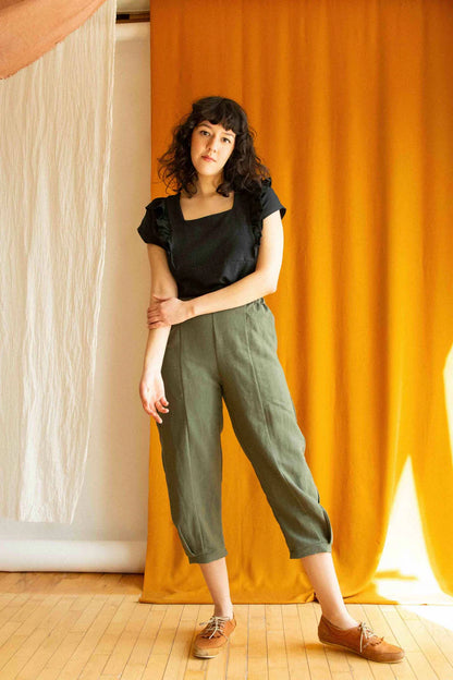 Pissenlit Pants by Kazak, Olive, cropped, pleats at lower leg, banded cuffs, slant pockets, elastic at sides and back of waistband, eco-fabric, viscose and linen, sizes XS to L, made in Montreal