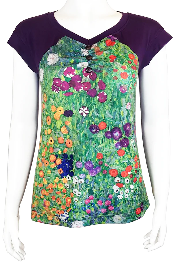 Easel Panel Tee by Mandala, Klimt Garden, art print front panel surrounded by solid colour, v-neck with gathers and triple button detail, raglan yoked extended cap sleeves, sizes XS to XL, made in Ontario 