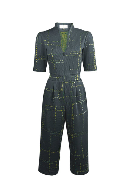 The Jonathan Jumpsuit by Melow in Anthracite is shown against  a  front of a white background 