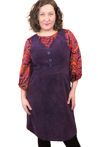 Joni Corduroy Jumper by Mandala, Purple, V-neck, wide straps, decorative buttons, band at waist, hip pockets, sizes XS to XXL, made in Ontario