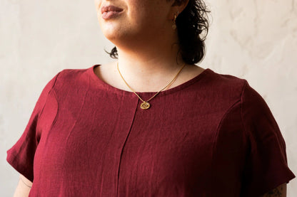 Detail of the top of the Astoria Dress by Lights of All in Garnet