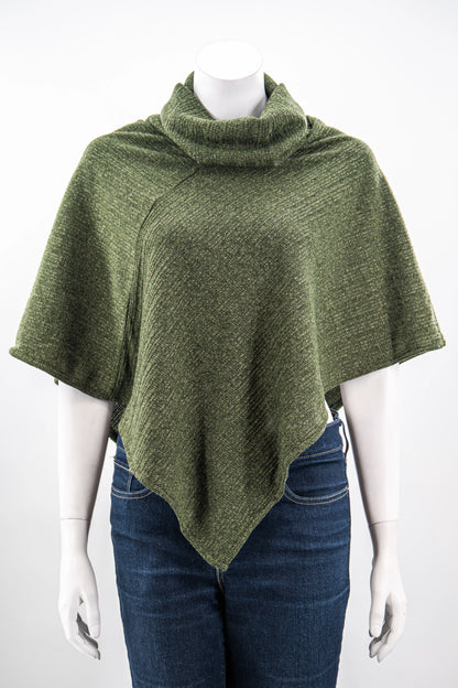 The winter Poncho by Karkass in Green, with a large turtleneck and angled hem, is shown on a mannequin against a white background