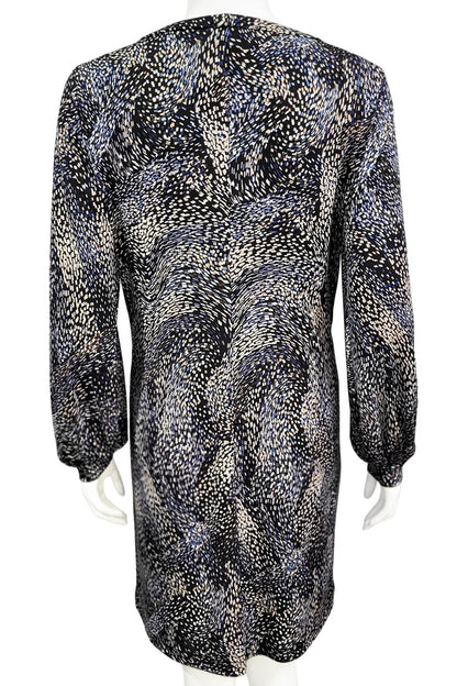 A back view of the Gwyneth mini dress from Mandala in Starry Night - Blue is shown on a mannequin against a white background 