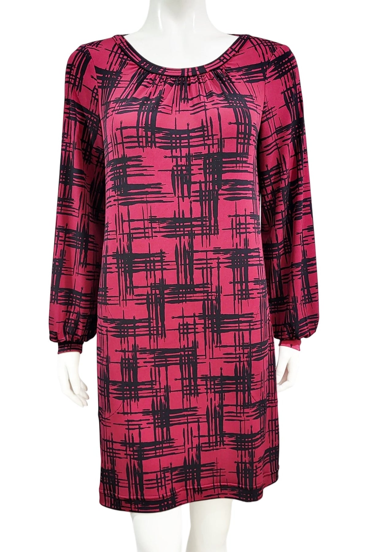 The Gwyneth mini dress from Mandala in Hopscotch - Cherry is shown on a mannequin against a white background 