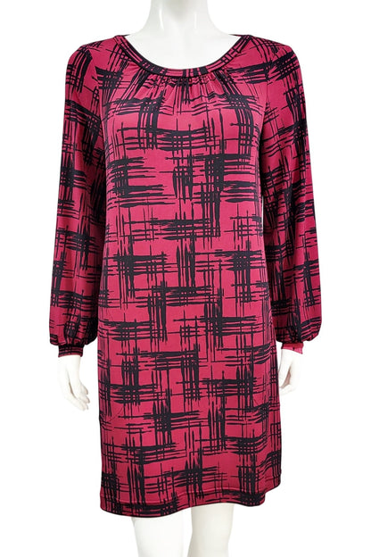 The Gwyneth mini dress from Mandala in Hopscotch - Cherry is shown on a mannequin against a white background 