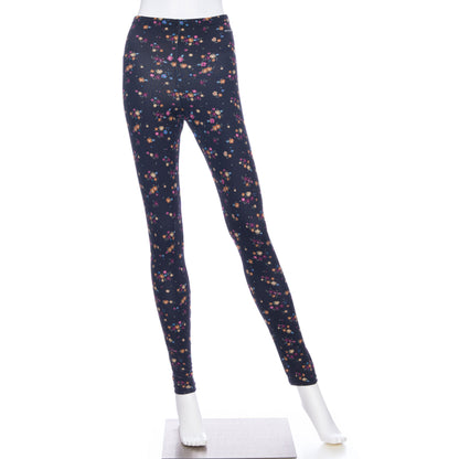 The Laracin Leggings by Rien ne se Perd in a small Floral print are shown on a mannequin in front of a white background. 