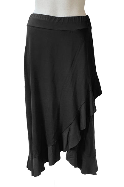The Catrina Skirt by Pure Essence in Black is shown on a mannequin against a white background