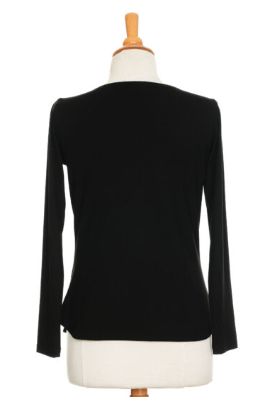 A back view of the Gauguin Sweater in Black by Rien ne se Perd is shown on a mannequin in front of a white background