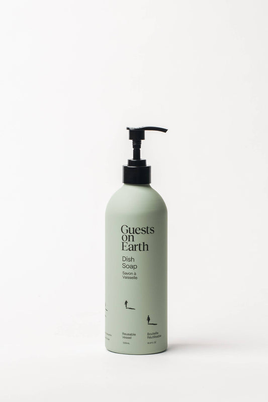 Guests on Earth Dish Soap in a matte sage green bottle with a black pump dispenser, set against a plain white background.