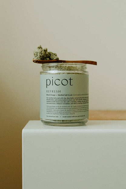 Jar of Picot Refresh Salt Scrub on a white surface with a neutral background