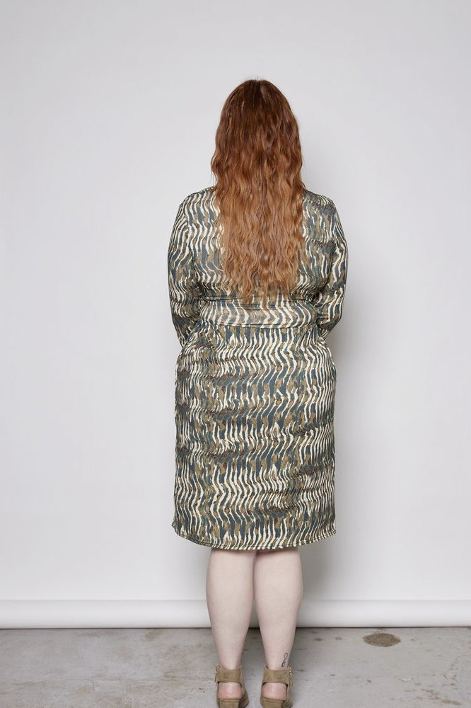 Gwen Dress (Ecovero) by Tangente, Green, eco-fabric, back view, LENZING ECOVERO, viscose, long sleeves, knee-length gathered skirt, attached ties at waist, in-seam pockets, sizes XS to XXL, made in Ottawa