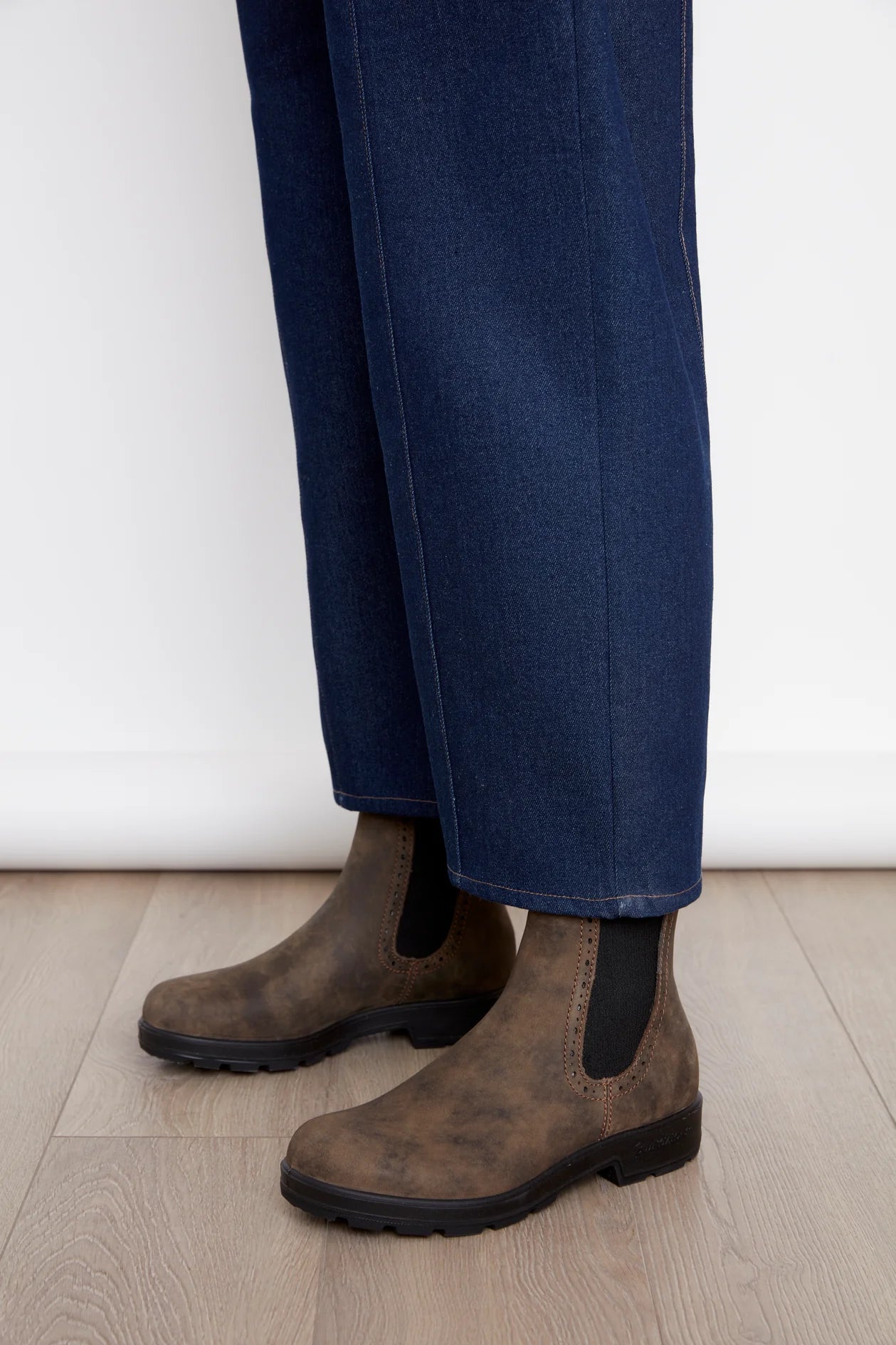 Close up of the legs on the Alice Straight Leg Jeans by Julei in Dark Denim. 