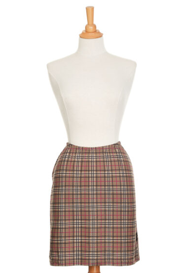 The Rosa Skirt by Rien ne se Perd in Plaid is show on a mannequin in front of a white background