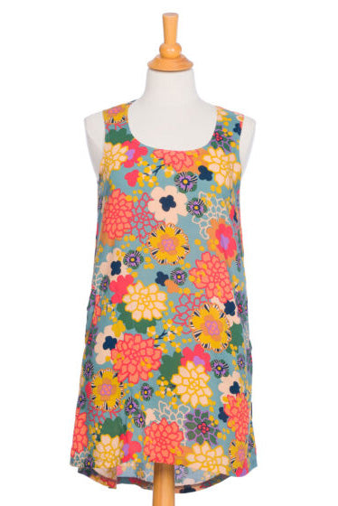 Ariana Tunic by Rien ne se Perd, Blue, colourful floral print, trapeze shape, rounded hi-low hemline, sleeveless, two pockets, sizes XS to XXL, made in Quebec