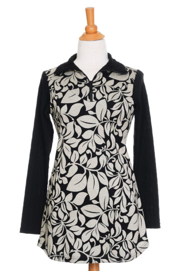 The Marcelle Tunic by Rien ne se Perd in Foliage Black and White is shown in front of a white background 