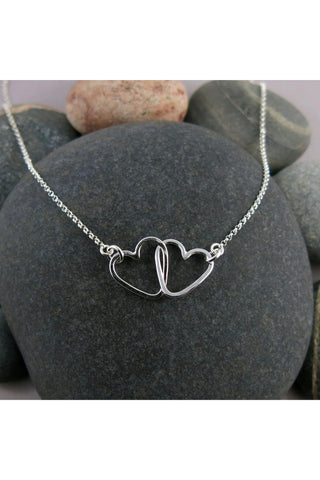 Hearts Embrace Necklace: Sterling Silver 2021