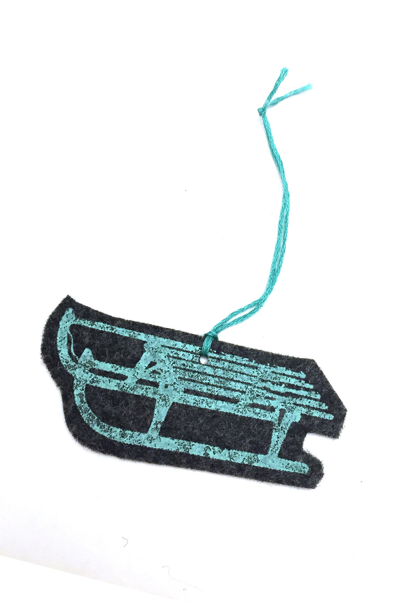 Turquoise sled ornament detail
